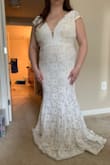 This dress is beautiful and elegant, but it wasn't quite the look I wanted for my outdoor wedding. It was also a lot longer than I expected (I am 5'3" and not wearing any shoes in this photo), so I would have needed to get it tailored. Additionally, the dress didn't close up all the way so I would have had to get a larger size and get it tailored even more - however, this isn't super uncommon for me: when I was trying on dresses in a store the lady said I was between a size 16/18 because a 16 generally fits, but sometimes my back would be too broad so I would have to go up a size. I ended up choosing a different Lulus dress that was absolutely perfect!! - Vanessa F.