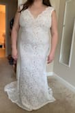 This dress has a beautiful train and a nice and comfortable design. I personally think you could dress it up a lot more with some accessorizing, or even getting some beadwork added to make it stand out more as a wedding dress. I wasn't able to zip up the last 2 inches or so, but I wouldn't have wanted to go up a size because then it would probably look too big on me and require more tailoring. I would have needed to add some kind of corset lacing to close it all the way, and also take off a few inches because the dress was too long for me. I ended up choosing a different Lulus dress that was more flattering for my body and didn't need any tailoring! - Vanessa F.