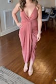 Wore this to a wedding reception. It's a Jersey like fabric so there is stretch to it. Hugs in all the right areas. Fun and comfy! - Quyen T.