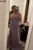 This dress fit me like a glove and is so gorgeous! The only issue is that the train is super long and I'm short, but I will be getting it altered for prom and it will be perfect!!! - Rachel S.