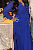This dress was so beautiful and I got many compliments on it! I ordered a XL and had to get it hemmed and the arms were a bit long so I had to get them shorter. The arms were tight at the top so I had to get it bigger too. After it was altered it fit perfect and was so comfortable. - Sharese R.