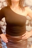 Very comfortable. Fits true to size.no support. Stretching material. Need to wear a bra. Can be dressed up or down. - Irina E.