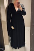Great dress, classic but a little daring. I'm 6'1", & was still able to wear 2-inch pumps no problem! I usually waver between a large & XL (12-14) and did best in XL. - Danielle S.