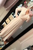 Ordered the blush pink. It definitely is more of a blush peach. I read the reviews and decided to go a size smaller than recommended, which was a good choice. The upper part of the dress on my chest is too long for me, and the dress is on the long side as well. I think it's a nice dress, I'll be returning it though. I might reconsider this dress down the line in a different color for a different occasion. - Melissa G.