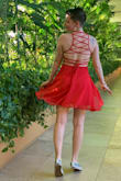 I got sooooo many compliments on this dress! The color really pops, the spin factor is out of this world, and the back really impresses! I'm short and even with sneakers I felt like a long legged beauty in this little number! Also the cut of the top is very flattering, and the tie-up back means it's fully adjustable. Definitely listen to other reviews that it's a challenge to get on; my partner helped me and I have absolutely no idea how I would've managed it by myself. It was a fun story to tell at the cocktail hour and so worth the effort :-) - Moxy W.