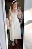 I really like this dress, the waistline is different and really flattering. The skirt is fuller than I realized but I really like it. It makes me feel like I'm in a Disney fairytale haha. It's a little snug but not enough to make my size up. The top is see-through but if you wear a hidden bra, it should be fine. I put in bathing suit cups just to get an idea and you can barely see them. Definitely recommend this dress! - Alexa W.