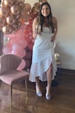 Loved this dress! I wore this dress for my bridal shower and it fits perfectly. - Skyler B.