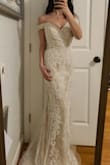 This was even prettier in person. There's a lot of sparkle that shows up more in the video than in photos. I'm so excited to wear this for my wedding. The material is heavy and feels like really good quality, similar to what you'd find in a bridal salon. The built-in cups were perfect and I won't need to add a bra or anything for my wedding day. - Rachel F.