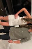 This two piece was perfect for my bachelorette party! It fit true to size and was honestly very flattering! The material is not stretchy at all but it was still comfortable! Would definitely recommend for a night out! - Courtney P.