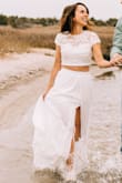 I bought this dress to wear for my engagement pictures and was perfect! It was a little long, so I had to get it hemmed, but I expected that as I'm only 5'4". Otherwise, super happy with it! - Alyssa L.