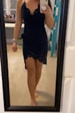 Every dress I've ordered from Lulus I've been an XS, so I ordered this in an XS. i could barely fit it over my butt. Keep in mind that this dress doesn't have much stretch. I exchanged it for a S and it is too big. In theory, I could have worn it out, but I like my dresses to hug my curves more. The S left a lot of extra fabric on my back and sides that I didn't like so I ended up returning. Overall, cute dress but didn't fit my body well. - Kaitlyn P.