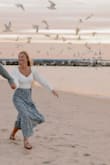 This top was perfect for engagement photos! I wore it with a longer flow skirt and it was so cute I loved the fit of the top, it was very flattering. Not see through. Great quality - Erin M.