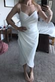 This dress is stunning. I was worried it was going to be sheer. However, the lining does a great job. I still would stick to nude underwear but still pretty impressive for a white dress. Planning to wear it to my rehearsal dinner. Love how it looks on. - Sarah H.