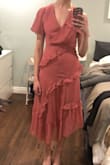 My husband loved the ruffles and flowing skirt. I have a small chest, so I would need to pin the top. I was worried about the color, it looked so red in uploaded photos, but the color was the dusty rose as depicted online. - Emma E.