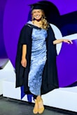 This is not a dress I would have normally chosen but I'm so glad I did! I wore it for my master's graduation and I felt so confident, classy, and beautiful. I would have normally ordered a large, but because of the other reviews saying it ran large, I sized down and the medium fit me perfectly! Definitely order a size down if you're unsure or in between sizes. I have a bit of a belly and a muffin top, but I wore my Spanx and the dress hugged my curves in all the right places. The fabric is gorgeous under lights and is such a great fit for so many occasions. Wearing it again to my boyfriend's graduation next week! 10/10 would recommend this dress, and order a size down! - Delaney W.
