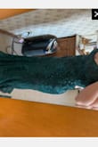 This dress is absolutely gorgeous, and perfect for the price. Small heads up to my larger breasted tall girls- if you buy an xl for yourself it might be slightly longer and hit the floor. - Abigail H.