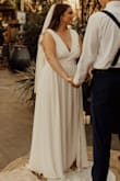Had a lot more cleavage than what's in the picture. I ordered it as my wedding dress so we had to alter it so that I wouldn't flash everybody. Great material and gorgeous dress though! - Andi W.