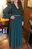 This dress is beautiful! The wrap style gave it a bit of wiggle-room size-wise. For my height of 5ft 5in, I did need to wear a heel to keep me from tripping but was planning to anyway.
I ended up adding a gold belt and a gold tube top underneath (because of the event)
I love the buttons on the sleeve, and like how loosely the sleeves fit, keeping the dress airy. Sleeves are long.
So far I have worn it for a St. Patrick's day event but it's the perfect color for Christmas and other events in the cooler months! - Erika H.