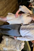 This dress couldn't have fit any better! I ordered a small, and wore it for my daughters baptism. I thought I was going to have to wear spanks underneath because of the lace top, but it was loose enough that a full coverage beige bra worked perfectly. - Kathryn