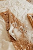 These are so beautiful and fit perfectly! They are extremely comfortable and I love how classy they are! The feathers are beautiful and the quality is great! I ordered a 7 1/2 and it was perfect! - Araylia S.