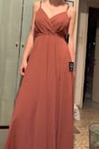 The dress came quickly, fit perfectly and the material feels of high quality <8 - Arbel O.