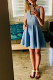 Generally I order S/M and read the reviews and sizing down was good. Material is thicker and isn't best on hot hot days, but nice length and more coverage than a mini. Perfect for street fare, looks good with flat sandals for walking. - Kady F.