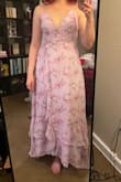 I sized down based on other reviews. Fit me well and was flattering but the print felt a little too "Anne of Green Gables" for me. - Kyra M.
