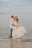 This dress is everything that I hoped it would be. I bought this for my engagement photos and it was just so beautiful and flowy for beach photos. I ordered an XL because the previous wrap dress that I ordered in a M showed way too much chest. It's just a tiny bit long but it worked out perfect for photos! - Tiffany L.