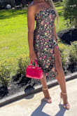 Loved wearing this dress! I got so many compliments. Originally when it came in, it was not as fitted on the waist, hips, and thighs as I would have thought. So I had it tailored to the fit I wanted. The original fit is more straight down and not as fitted in the torso. (I'm assuming they clipped the dress on the model for photos). The slit was very high when sitting down but easy to cover with a purse or shawl of some sort. I ordered a small. - Khalyn C.