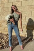Overall this shirt fit great! It is very flattering and you don't need a bra with it. Material was great quality and I got a ton of compliments!! - Olivia L.
