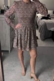 This dress is super comfortable! Very light & flowy, I love the stretchy ribbed waist. Cute for a date night or casual day. I ordered both a small and a medium. Small fit better in the waist but ultimately went for M to have more length to the dress. I'm 5'5, 135-138lbs - Laura B.