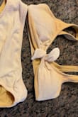 Was a cute bathing suit but after wearing it once in the pool the color completely faded and I had to throw it away. Do not waste your money! - Danielle W.