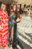 Overall loved this dress! The color was a deep, stunning teal. Complimented the right body parts. I ordered a large after reading several reviews and ultimately should've gotten a medium- it was pretty long (even wearing wedges it was on the ground) and the waist/chest could've been snugger. BUT so many compliments- wore it in Mexico for a beach wedding! - Shana D.