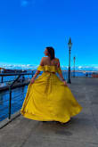 I adored this dress! It was a beautiful color, so flowy and high quality material. The snap around the bust was hard to keep closed, but honestly, I liked it better without it. I had many comments about looking like Belle, which was so fun. Highly recommend this dress, you'll feel beautiful! - Nicole E.