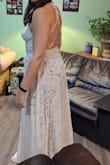 This is going to be my dress for my wedding! (well.. not this one, I'm going to have to exchange it for a size bigger) but I knew when I ordered it that it would be a little tight. Considering price, and the way it's constructed it makes sense that it would be hard to let it out any. The lace is lovely, soft, and just the right combination of fancy and rustic for our country wedding. The 'nakedness' isn't quite my style, so I will have some kind of skirt added underneath - But I'm so excited to find something that is the right style (and cost) for me! - Joanna B.