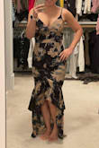This dress has just the right touches of detail to give it a fun, flirty, and unique look. The material is light and flowy and the fit was just right. The only thing I don't love is the seam running down the front but it's not a deal-breaker for me. The length is a bit long if you're on the petite side so be prepared to wear taller heels. - Crystal D.