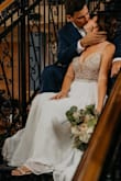 This was the most perfect wedding dress for me. I did get it tailored (I wanted a bustle and a couple of areas to be tighter) but all in all, between the dress and tailoring, it was under $400...FOR A BEAUTIFUL WEDDING DRESS! It doesn't have to be expensive, to be perfect for you.
You won't regret it! - Colleen M.