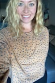 This is a great cropped sweatshirt. It's a little too cropped and has very baggy arms but it's SO comfortable! I wear it allll the time. Usually with a cute bralette to poke out of the bottom when you lift your arms. - Sarah K.