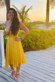 Wore this dress as a guest to a destination wedding at Turks and Caicos and it was perfect! I love the way the dress flowed and the material is breathable for the warmer climate. Received tons of compliments! My waist is 28" so it was a tad tight since I bought a small but because the zipper and clasp is placed lower, I didn't have a hard time zipping it right up. The adjustable straps were perfect as well. Had to get help to adjust it firmly since my bust is on the smaller side. Otherwise, I love it! - Sheryl L.