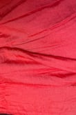 I like the skirt but I wish it was a true red. It is more orange or maybe even a corral. I tried to capture the true color but it does look red through the camera but not in person. - Mycah L.