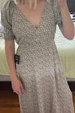 This dress is exactly what I was looking for for family photos for my sons birthday! Its so cute and the material is great quality. I'm glad I listened to the reviews in sized down. I'm normally comfortable in a medium & the small fits perfectly, with a little room actually since the waist is stretchy. I'm excited to wear this with a baby bump in the future hehe. - Molly B.