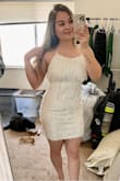 It fits so good and the material on the inside is soft! Was nervous about the low back but it comes up a good amount. I walked around a bit after trying it on to see if it rides up and it doesn't. Love this dress for my bachelorette party - Thalia C.