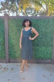 This dress was very flattering, and the color looked amazing. The dress was a little fitted on the top portion however I do have a wider back than normal. However, I still wouldn't change the size. I definitely recommend it, it was so beautiful and I received so many compliments. - XIOMARA H.