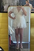 The dress is cute and seems well made (i.e., it is not see through and the fabric doesn't feel particularly cheap). It fits well in the bust and around the arms, but is entirely too short. The lining of the skirt being so much shorter than the 'flounces' on the outside provides no coverage if you're taller/have longer legs. I ordered a L and will try to exchange for a size up, but am worried that will make the bust too big in turn. Tough call! - Audrie F.