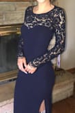 I wore this for my senior year prom and got so many compliments on the sleeves and the back! It fit like a glove, which I was very nervous about. I did alter it to put a slit in the side, but other than that, it fit perfectly. I've also been able to wear it for other events as I've aged. - Kathryn F.
