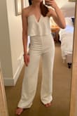I bought this for my rehearsal dinner as a bride, but I ended up returning it because the bust was too loose and slipped down when I moved, while the stomach was too tight and unflattering (always had creases that drew attention to that area). I don't have big curves, so if you have an athletic build like me this might not work on you. - Morgan H.