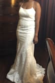 I absolutely love this dress. I plan to wear it to my beach wedding. It runs small. I normally wear a 4, but I returned it for a 6. I will probably have it altered to remove some of the length. Overall, I am very happy with the dress. :) - Asha J.