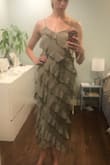I tried this dress in hopes of trying something new but it was too much for me. Looks great on the model, color and quality are good, the style didn't work for me. - Emma E.
