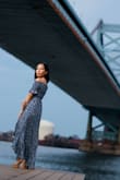 I wore this for my engagement shoot & loved it soo much! It wasn't too long (though, I was wearing some platform sandals). As a 4'11" girl, it's always so frustrating to try to find maxis that don't need altering. It fit me well in all the right places due to the stretch. I can't wait to wear this dress for other summer festivities. - Zefanne B.