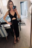 Usually, I don't look good in bodycon dresses like this, but this almost functions as shapewear. It smooths and hugs in all the right places. Low cut, but who cares? This is perfect for a summer evening date. - Charlotte S.